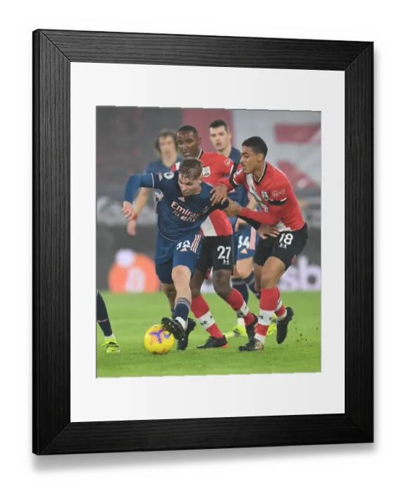 Framed Print : Emile Smith Rowe Clashes with Southampton Duo in Empty St. Mary's Stadium - Arsenal vs Southampton, Premier League 2021