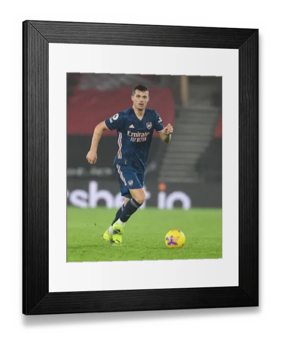 Framed Print : Granit Xhaka: Arsenal Star at Empty Southampton Stadium - Premier League 2020-21