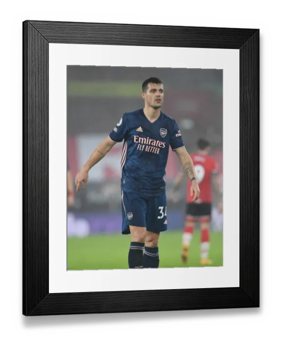 Framed Print : Granit Xhaka in Action: Arsenal vs. Southampton, Premier League 2020-21 (Behind Closed Doors) Framed Print : Granit Xhaka in Action: Arsenal vs. Southampton, Premier League 2020-21 (Behind Closed Doors)