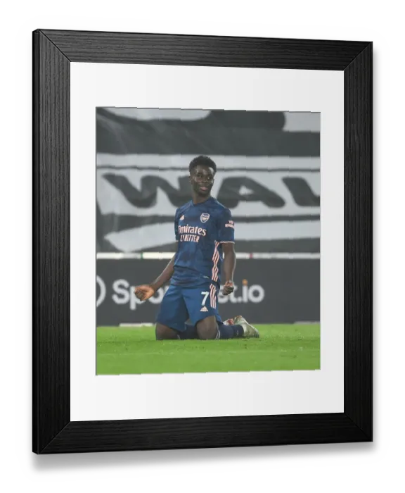 Framed Print : Saka Scores: Arsenal's Victory at Empty Southampton Stadium