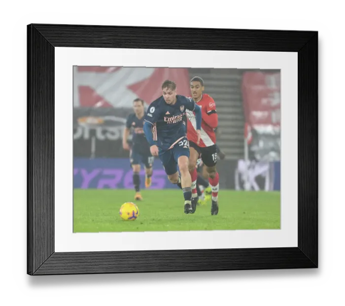 Framed Print : Emile Smith Rowe Breaks Past Southampton's Yan Valery in Empty St Mary's Stadium - Southampton vs Arsenal, Premier League 2021