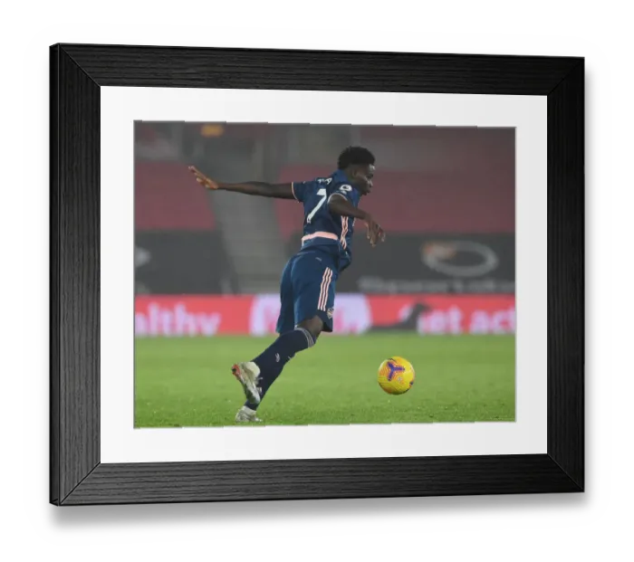 Framed Print : Bukayo Saka's Brilliant Performance at Empty St. Mary's: Arsenal's Standout Player in the Southampton Clash (2020-21 Premier League) Framed Print : Bukayo Saka's Brilliant Performance at Empty St. Mary's: Arsenal's Standout Player in the Southampton Clash (2020-21 Premier League)