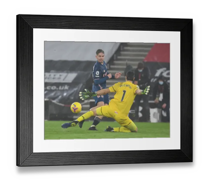 Framed Print : Emile Smith Rowe vs. Alex McCarthy: Battle at St. Mary's - Arsenal vs. Southampton, Premier League 2021 Framed Print : Emile Smith Rowe vs. Alex McCarthy: Battle at St. Mary's - Arsenal vs. Southampton, Premier League 2021