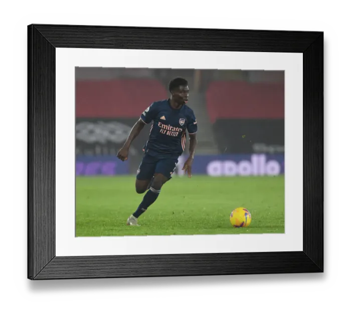 Framed Print : Bukayo Saka Shines in Empty Southampton Stadium: Arsenal's Premier League Victory, 2020-21 Framed Print : Bukayo Saka Shines in Empty Southampton Stadium: Arsenal's Premier League Victory, 2020-21