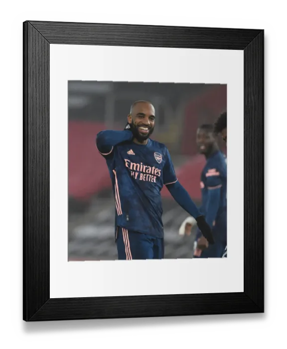 Framed Print : Alexis Lacazette's Hat-Trick: Arsenal's Empty-Stadium Victory over Southampton (2021)
