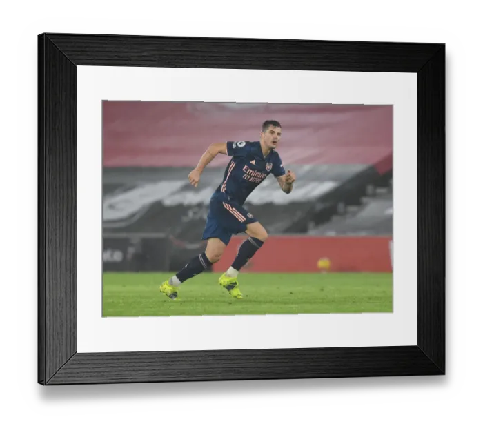 Framed Print : Arsenal's Granit Xhaka at Empty Southampton Stadium - Premier League 2020-21 Framed Print : Arsenal's Granit Xhaka at Empty Southampton Stadium - Premier League 2020-21