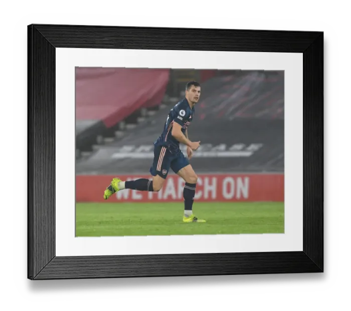 Framed Print : Granit Xhaka: Arsenal Star in Empty Southampton Stadium - Premier League 2020-21 Framed Print : Granit Xhaka: Arsenal Star in Empty Southampton Stadium - Premier League 2020-21