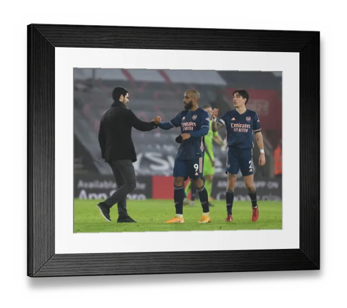 Framed Print : Arsenal's Arteta and Players Celebrate Win Against Southampton Amidst Empty St. Mary's Stadium (2020-21) Framed Print : Arsenal's Arteta and Players Celebrate Win Against Southampton Amidst Empty St. Mary's Stadium (2020-21)