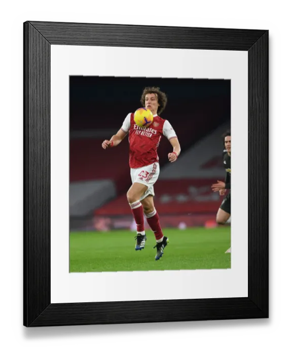 Framed Print : Arsenal vs Manchester United: David Luiz in Action at Empty Emirates Stadium, Premier League 2020-21 Framed Print : Arsenal vs Manchester United: David Luiz in Action at Empty Emirates Stadium, Premier League 2020-21
