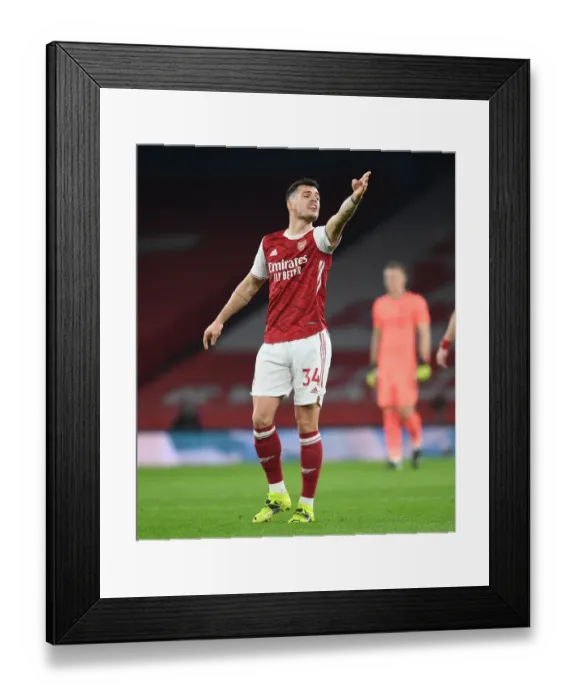 Framed Print : Granit Xhaka: Arsenal Star Shines at Empty Emirates Stadium Against Manchester United, Premier League 2020-21 Framed Print : Granit Xhaka: Arsenal Star Shines at Empty Emirates Stadium Against Manchester United, Premier League 2020-21