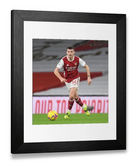 Framed Print : Arsenal's Xhaka Stellar Performance at Empty Emirates vs Manchester United (Premier League 2021)