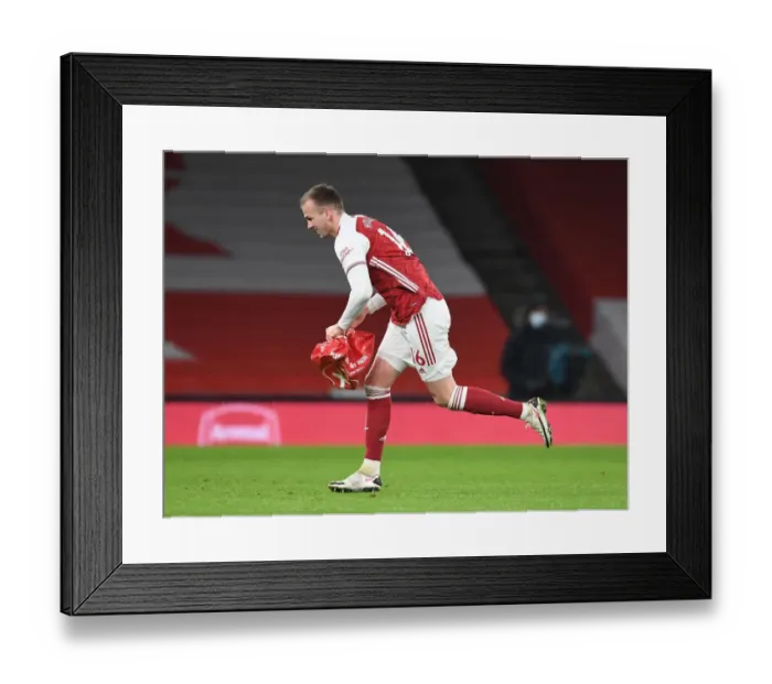 Framed Print : Empty Emirates: Rob Holding Clears the Field - Arsenal vs Manchester United (2020-21)