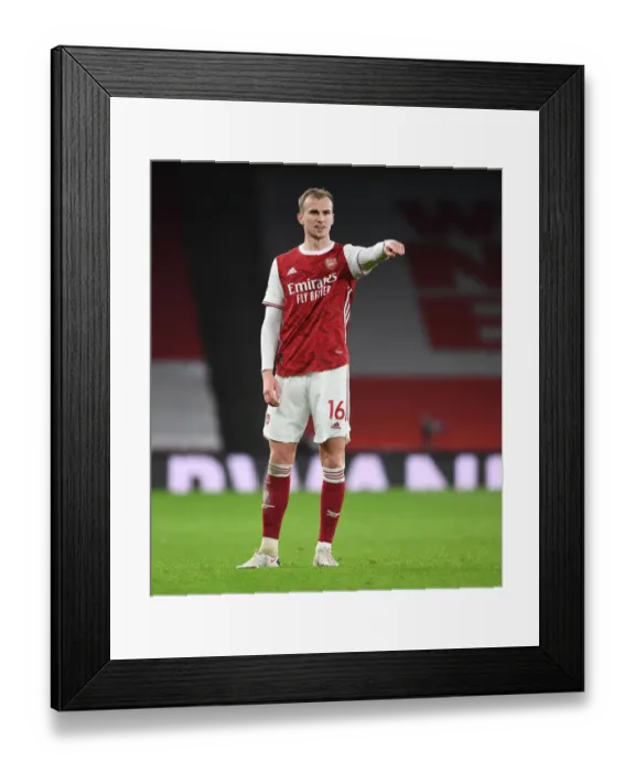Framed Print : Arsenal vs Manchester United: Emirates Battle in Empty Stands (2021)