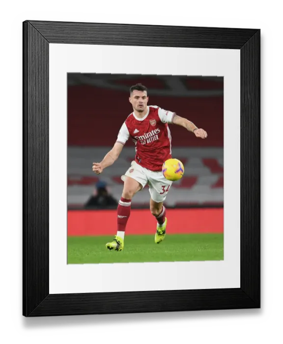 Framed Print : Granit Xhaka in Action: Arsenal vs Manchester United, Premier League 2020-21 (Behind Closed Doors)