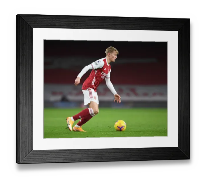 Framed Print : Arsenal's Martin Odegaard in Action Against Manchester United - Premier League 2021 (Behind Closed Doors)