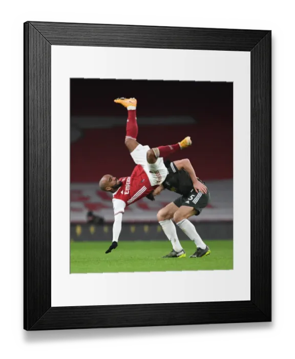Framed Print : Arsenal vs Manchester United: Lacazette vs Maguire in Empty Emirates Stadium, Premier League 2020-21