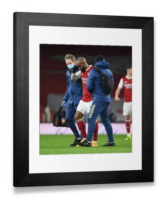 Framed Print : Arsenal's Alexis Lacazette Injured, Manchester United vs Arsenal, Premier League 2021 Framed Print : Arsenal's Alexis Lacazette Injured, Manchester United vs Arsenal, Premier League 2021