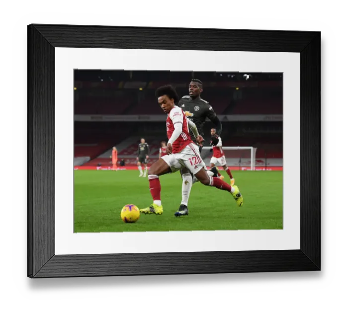 Framed Print : Arsenal vs Manchester United: A Pandemic-Restricted Battle at Emirates Stadium (2020-21)