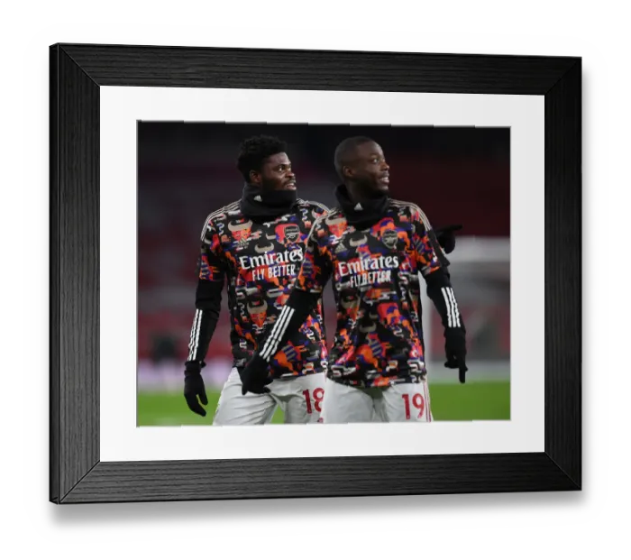 Framed Print : Thomas Partey Prepares for Empty Emirates: Arsenal vs Manchester United (2020-21)