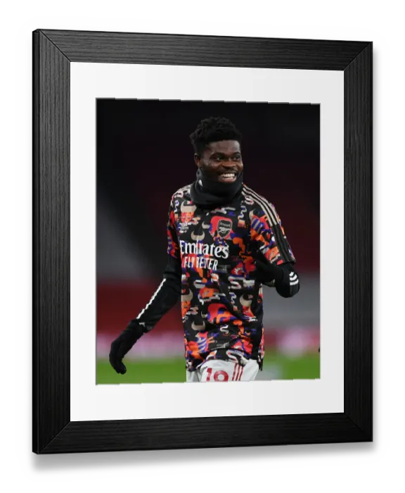 Framed Print : Thomas Partey Prepares for Empty Emirates Showdown: Arsenal vs Manchester United (2020-21) Framed Print : Thomas Partey Prepares for Empty Emirates Showdown: Arsenal vs Manchester United (2020-21)