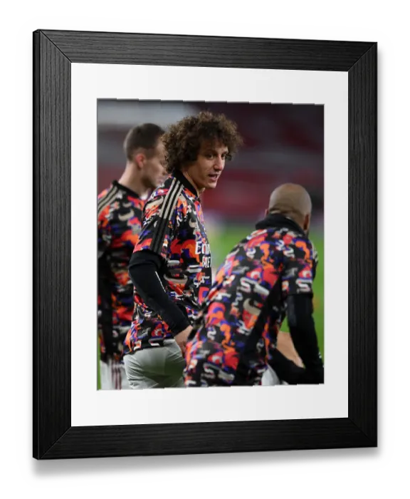 Framed Print : Arsenal's David Luiz Gears Up for Empty Emirates Showdown Against Manchester United (2020-21)