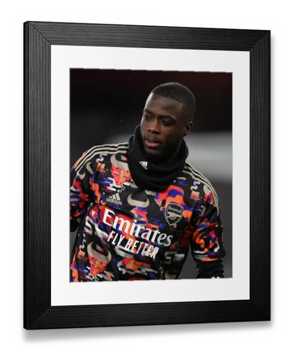 Framed Print : Arsenal v Manchester United: Pepe Warms Up Ahead of Empty Emirates Stadium Clash (2020-21) Framed Print : Arsenal v Manchester United: Pepe Warms Up Ahead of Empty Emirates Stadium Clash (2020-21)