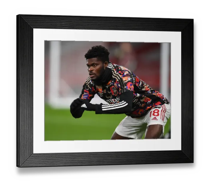 Framed Print : Thomas Partey Gears Up: Arsenal vs Manchester United (2021) - Empty Emirates Clash Framed Print : Thomas Partey Gears Up: Arsenal vs Manchester United (2021) - Empty Emirates Clash