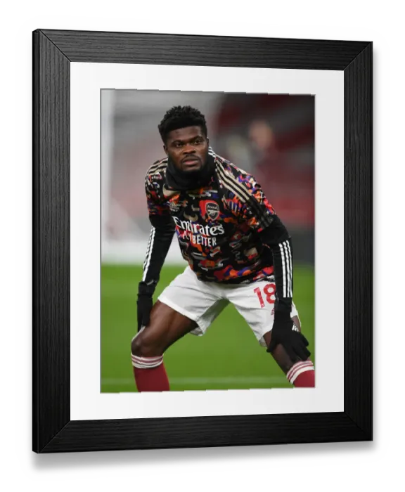 Framed Print : Thomas Partey Gears Up: Arsenal vs Manchester United (2020-21) - Emirates Stadium Showdown Amid Empty Seats Framed Print : Thomas Partey Gears Up: Arsenal vs Manchester United (2020-21) - Emirates Stadium Showdown Amid Empty Seats