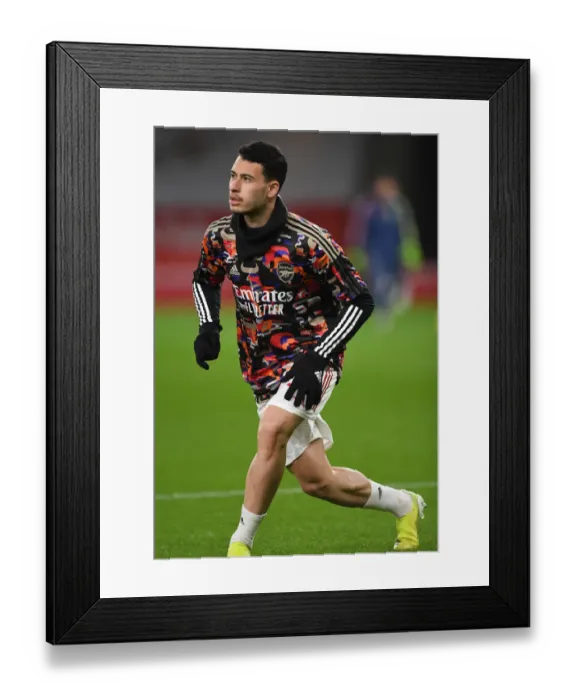 Framed Print : Arsenal v Manchester United: Pre-Match Warm-Up Amidst Empty Emirates Stadium (2020-21)