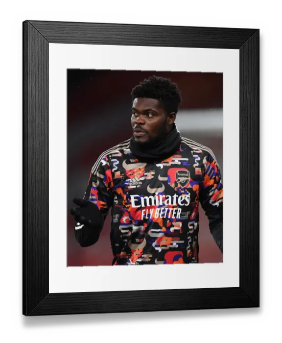 Framed Print : Arsenal vs Manchester United: Thomas Partey Warms Up Ahead of Empty Emirates Stadium Clash (2020-21) Framed Print : Arsenal vs Manchester United: Thomas Partey Warms Up Ahead of Empty Emirates Stadium Clash (2020-21)