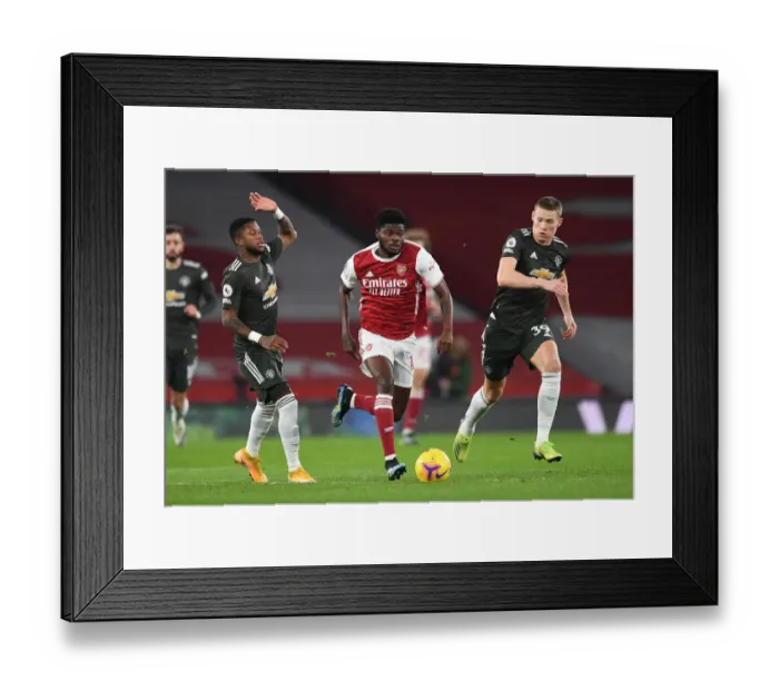 Framed Print : Thomas Partey Stands Firm Against Fred and McTominay: Arsenal vs Manchester United, Empty Emirates, Premier League 2021