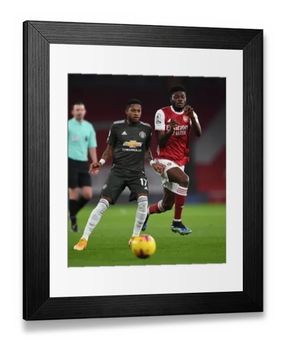 Framed Print : Thomas Partey vs Fred: Intense Rivalry in Empty Emirates - Arsenal vs Manchester United, Premier League 2020-21
