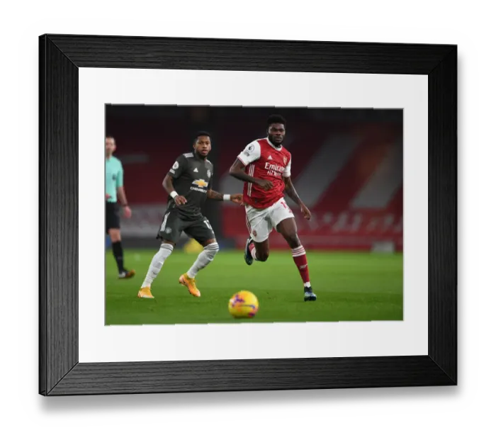 Framed Print : Thomas Partey in Action: Empty Emirates Stadium - Arsenal vs Manchester United (2020-21 Premier League) Framed Print : Thomas Partey in Action: Empty Emirates Stadium - Arsenal vs Manchester United (2020-21 Premier League)