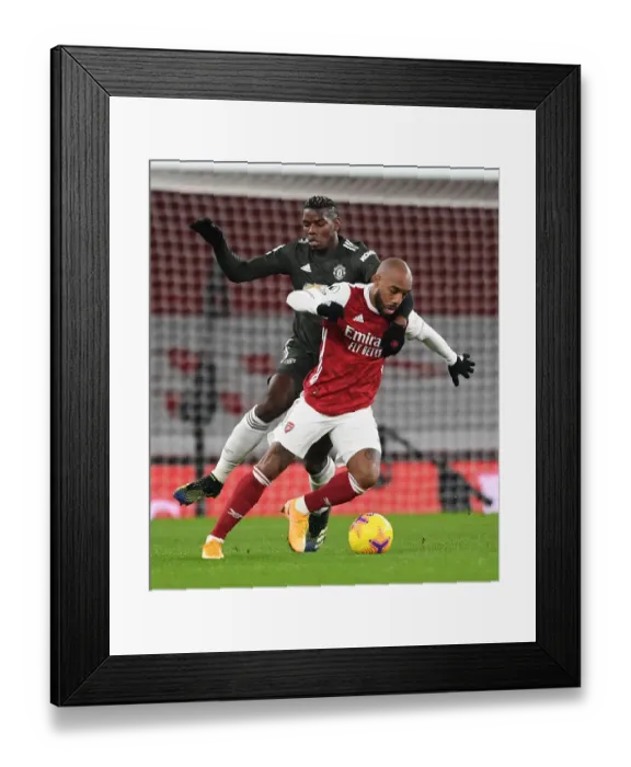 Framed Print : Arsenal vs Manchester United: Lacazette vs Pogba Clash in Empty Emirates Stadium, Premier League 2020-21 Framed Print : Arsenal vs Manchester United: Lacazette vs Pogba Clash in Empty Emirates Stadium, Premier League 2020-21