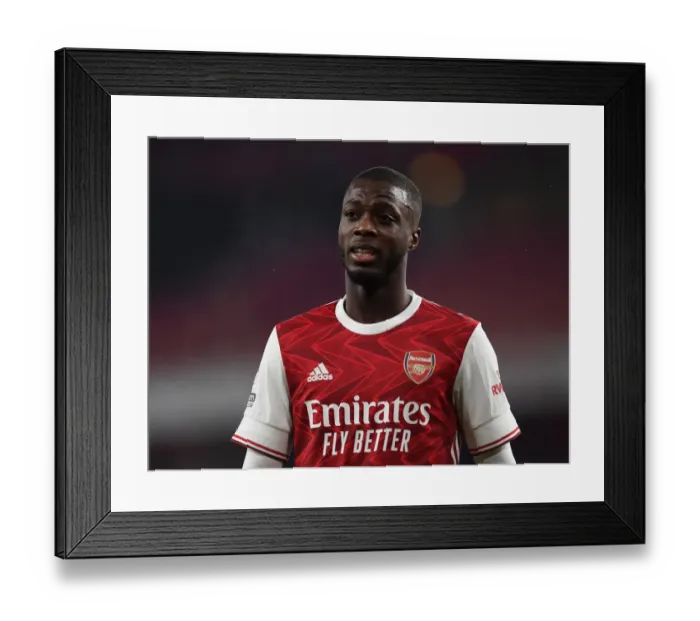 Framed Print : Pepe's Emirates Showdown: Arsenal vs Manchester United in Empty Pandemic Stadiums
