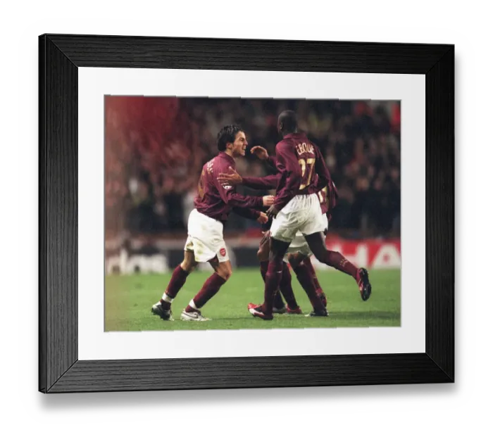 Framed Print : Cesc Fabregas and Emmanuel Eboue Celebrate Arsenal's First Goal Against Juventus in the UEFA Champions League Quarterfinals, 2006 Framed Print : Cesc Fabregas and Emmanuel Eboue Celebrate Arsenal's First Goal Against Juventus in the UEFA Champions League Quarterfinals, 2006