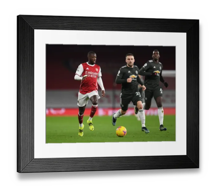 Framed Print : Pepe vs Shaw: Battle at Empty Emirates - Arsenal vs Manchester United (Premier League 2021) Framed Print : Pepe vs Shaw: Battle at Empty Emirates - Arsenal vs Manchester United (Premier League 2021)