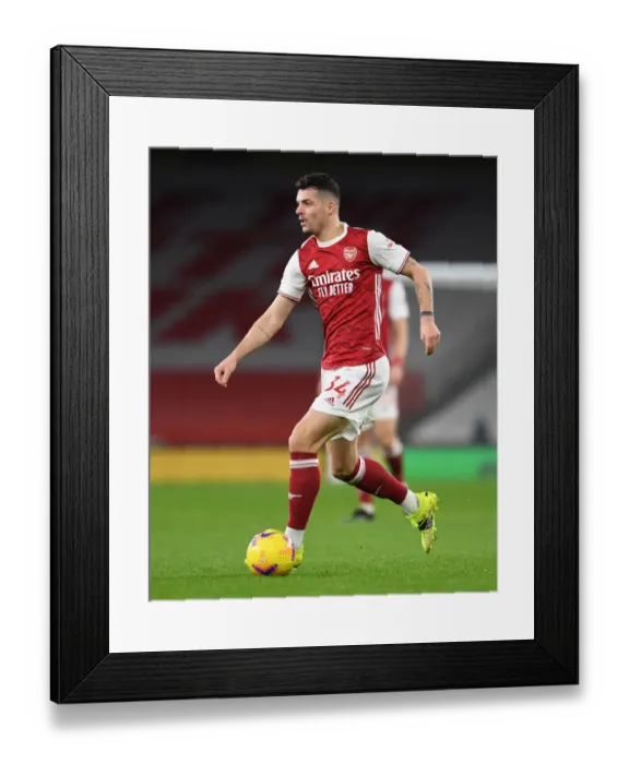 Framed Print : Granit Xhaka's Brilliant Performance: Arsenal vs Manchester United at Empty Emirates Stadium (2021) Framed Print : Granit Xhaka's Brilliant Performance: Arsenal vs Manchester United at Empty Emirates Stadium (2021)