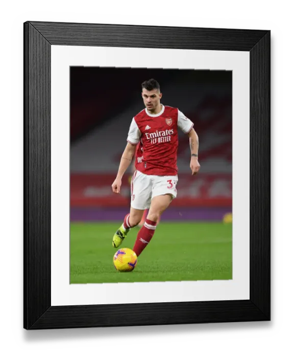 Framed Print : Arsenal vs Manchester United: Granit Xhaka in Action at Empty Emirates Stadium (Premier League 2020-21)