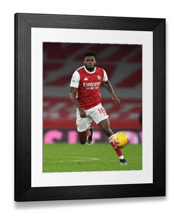 Framed Print : Thomas Partey in Action: Arsenal vs Manchester United at Empty Emirates Stadium (2020-21) Framed Print : Thomas Partey in Action: Arsenal vs Manchester United at Empty Emirates Stadium (2020-21)