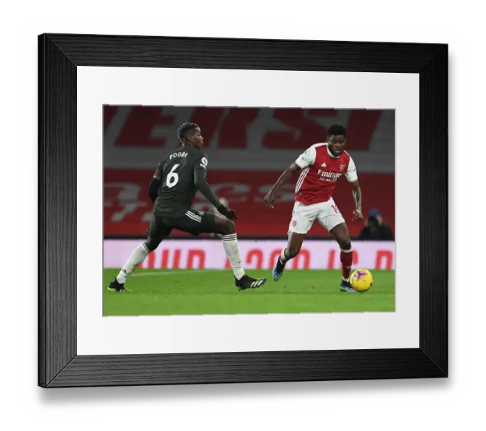 Framed Print : Thomas Partey vs Paul Pogba: A Battle of Midfield Titans in Empty Emirates - Arsenal vs Manchester United, Premier League 2020-21