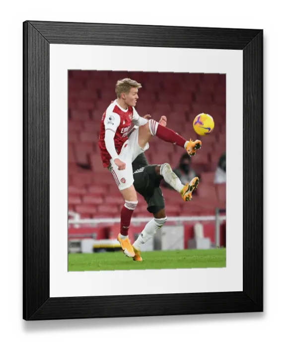 Framed Print : Arsenal vs Manchester United: Emirates Stadium Showdown in Empty London (2020-21)