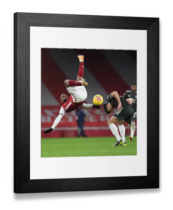 Framed Print : Arsenal vs Manchester United: Lacazette Tangles with Maguire in Empty Emirates Stadium Framed Print : Arsenal vs Manchester United: Lacazette Tangles with Maguire in Empty Emirates Stadium