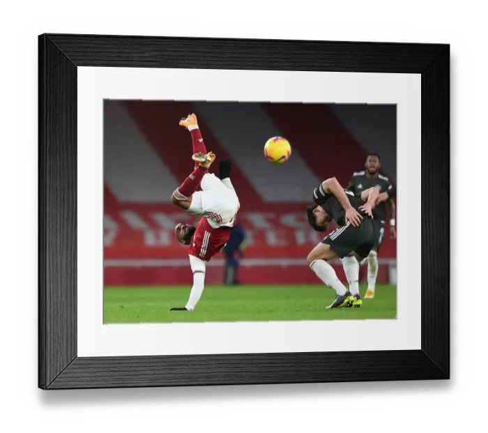 Framed Print : Arsenal vs Manchester United: Lacazette Falls After Challenge with Maguire in Empty Emirates Stadium (Premier League 2020-21) Framed Print : Arsenal vs Manchester United: Lacazette Falls After Challenge with Maguire in Empty Emirates Stadium (Premier League 2020-21)