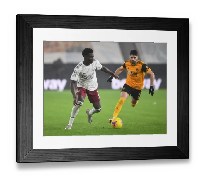Framed Print : Bukayo Saka vs Pedro Neto: Battle at Molineux - Wolverhampton Wanderers vs Arsenal, Premier League 2020-21