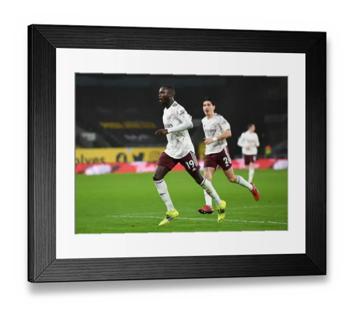 Framed Print : Pepe's Strike: Arsenal's Victory over Wolverhampton Wanderers in the Premier League