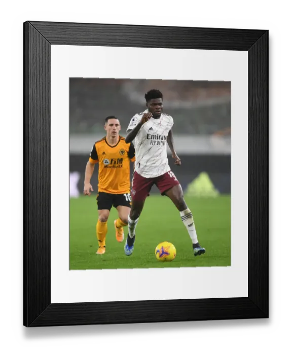 Framed Print : Thomas Partey in Action: Arsenal vs Wolverhampton Wanderers, Premier League 2020-21 Framed Print : Thomas Partey in Action: Arsenal vs Wolverhampton Wanderers, Premier League 2020-21