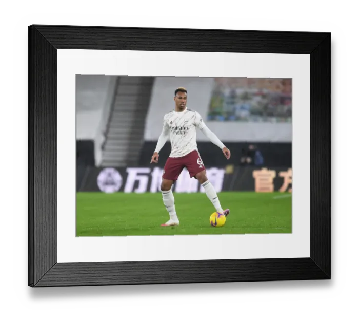 Framed Print : Gabriel Magalhaes Intense Concentration: Arsenal's Battle at Molineux Framed Print : Gabriel Magalhaes Intense Concentration: Arsenal's Battle at Molineux