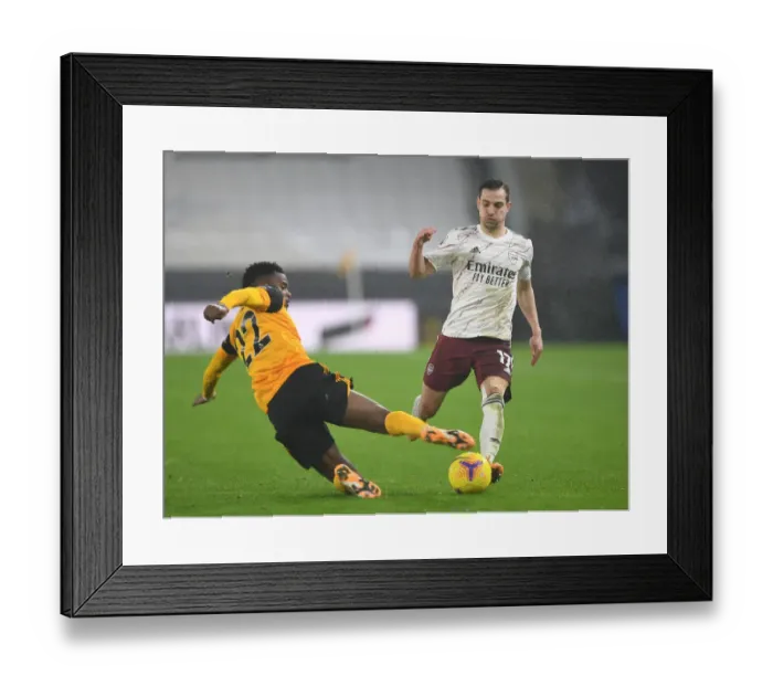 Framed Print : Intense Rivalry: Cedric Soares vs Nelson Semedo Battle at Wolverhampton Wanderers vs Arsenal
