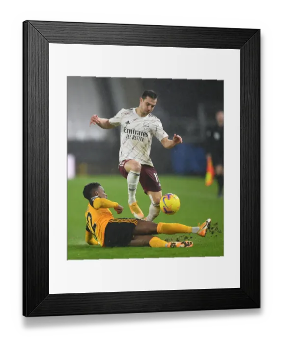 Framed Print : Intense Rivalry: Cedric Soares vs Nelson Semedo Battle at Wolverhampton Wanderers vs Arsenal (2020-21)